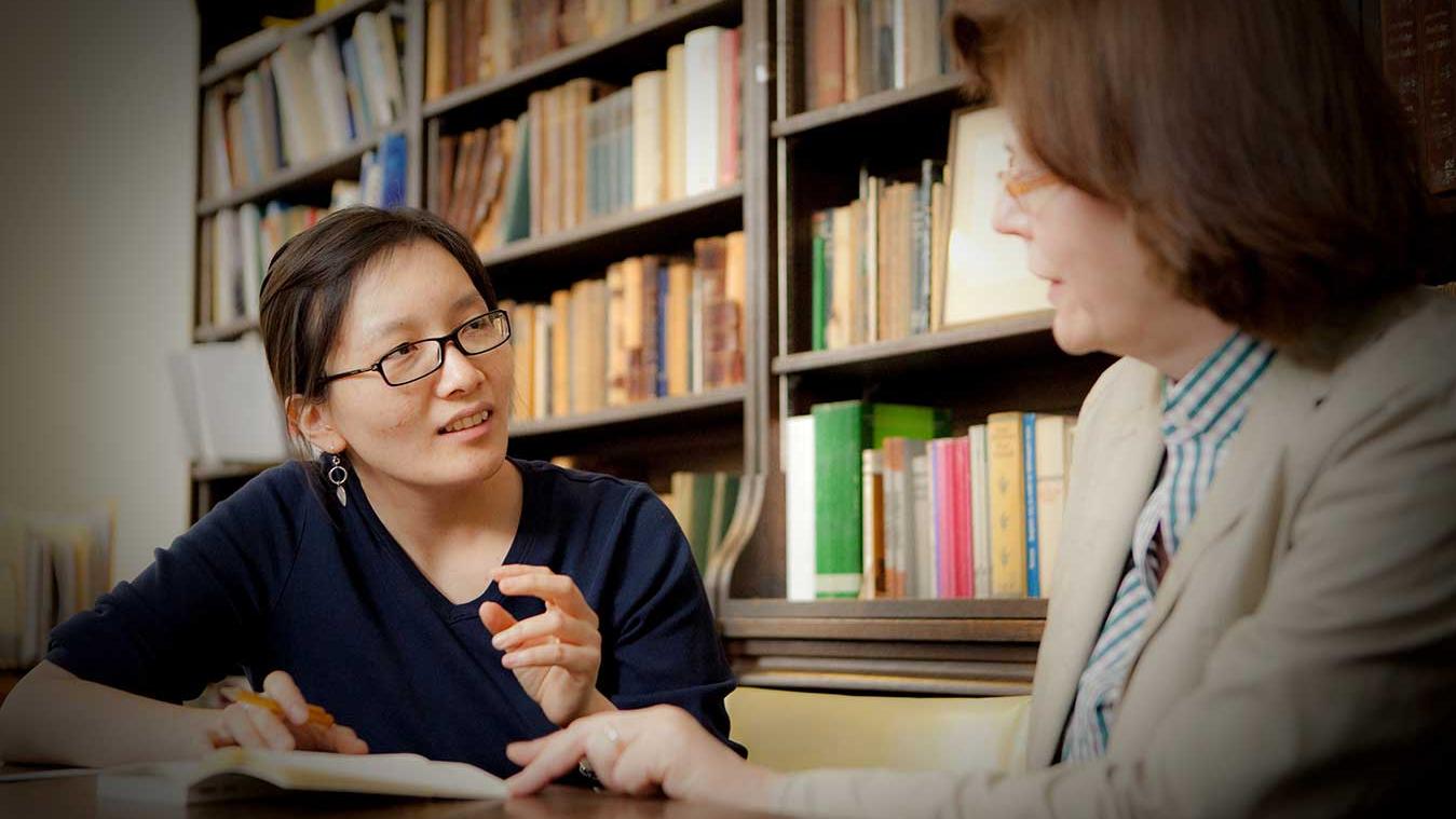 German Studies student working with a professor